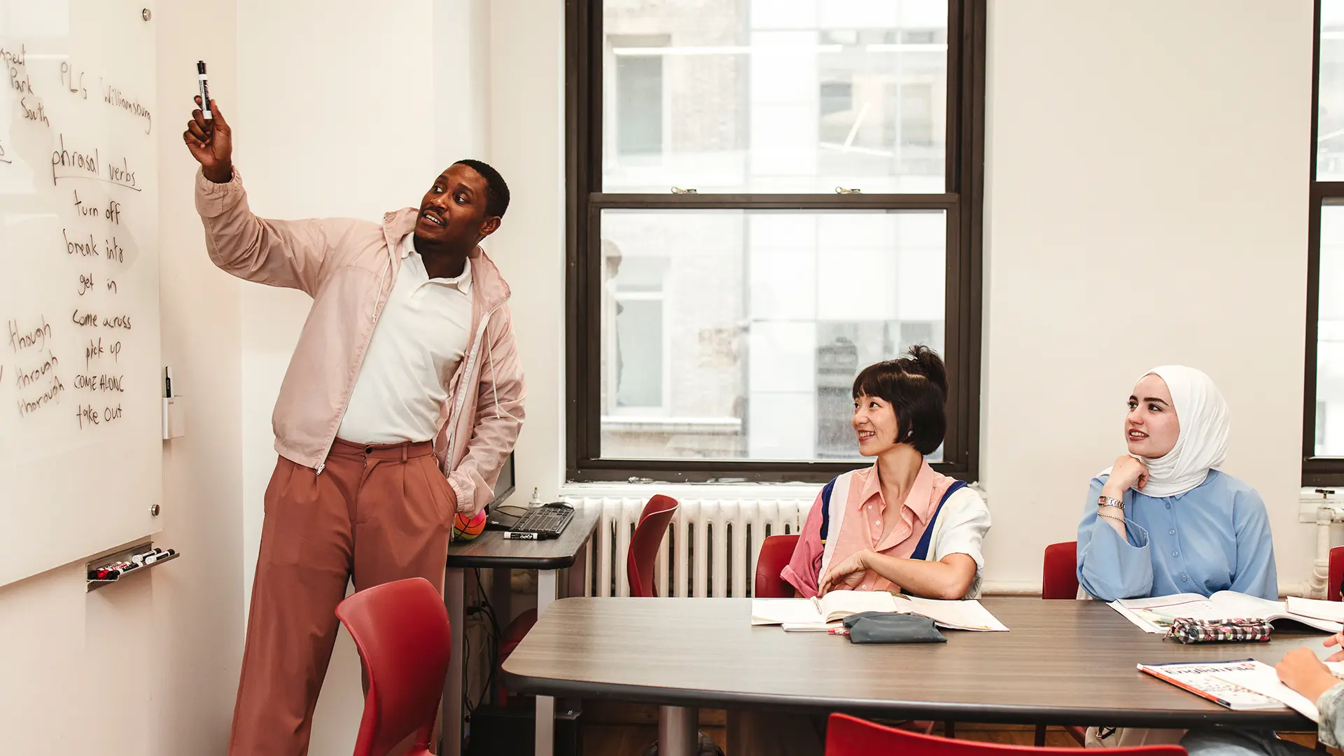Students attending a semi-intensive 16 English course class